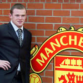 Wayne Rooney poses after signing for Manchester United from Everton in 2004. Picture: AUL BARKER/AFP via Getty Images