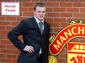 Wayne Rooney poses after signing for Manchester United from Everton in 2004. Picture: AUL BARKER/AFP via Getty Images