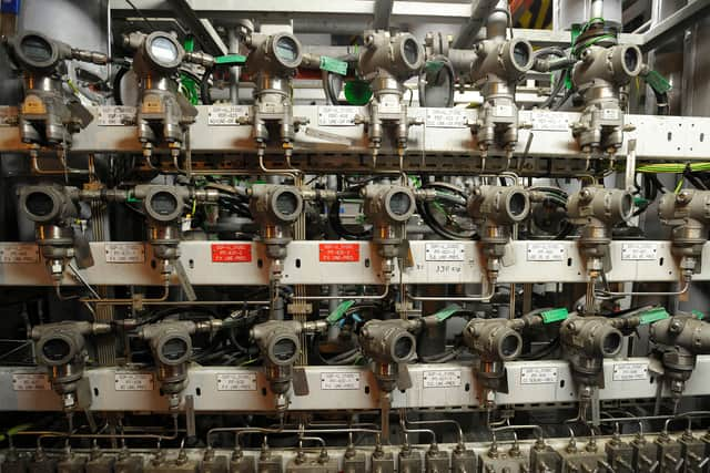 Inside a gas plant. Photo: Andy Buchanan/AFP via Getty Images