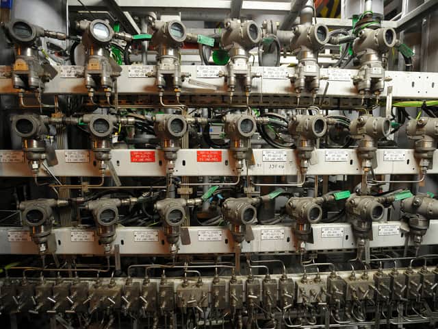 Inside a gas plant. Photo: Andy Buchanan/AFP via Getty Images