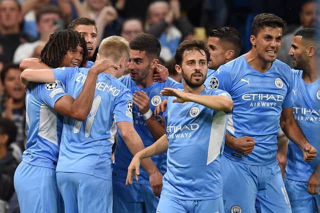 <p>Manchester City celebrate scoring. Credit: Getty.</p>