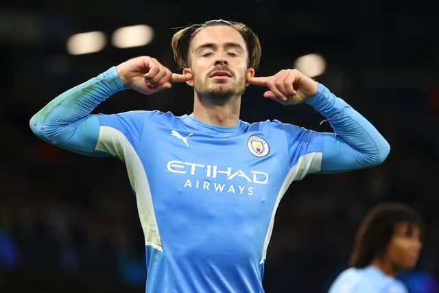MANCHESTER, ENGLAND - SEPTEMBER 15: Jack Grealish of Manchester City celebrates after scoring their side’s fourth goal during the UEFA Champions League group A match between Manchester City and RB Leipzig at Etihad Stadium on September 15, 2021 in Manchester, England. (Photo by Michael Steele/Getty Images)
