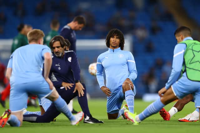 Nathan Ake warms up ahead of Leipzig game. Credit: Getty.
