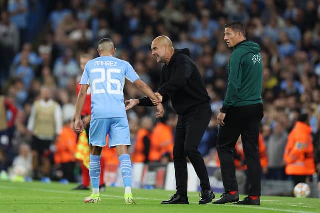 Guardiola exchanges words with Mahrez on Wednesday. Credit: Getty.