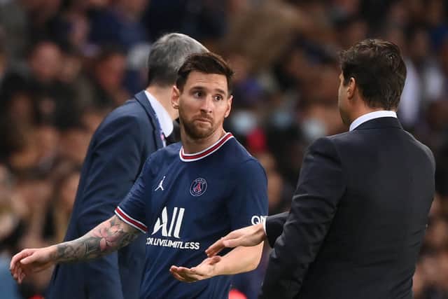 Messi and Pochettino exchange words after the striker was replaced.