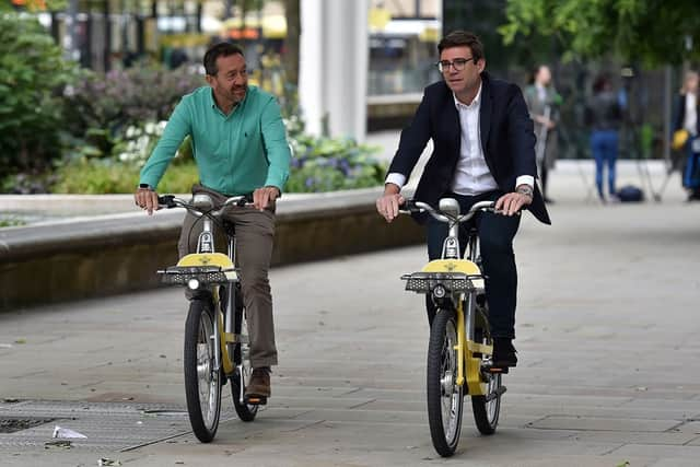 Chris Boardman with Andy Burnham  Credit: TFGM