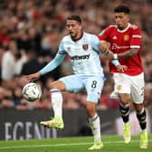 Jadon Sancho battles with Pablo Fornals of West Ham  Credit: Getty Images