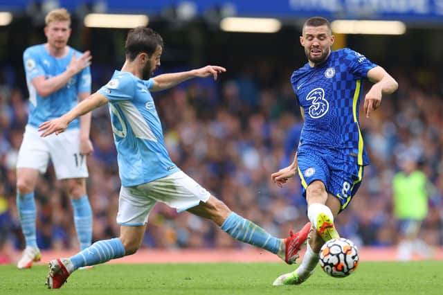 Mateo Kovacic of Chelsea is tackled by Bernardo Silva  Credit: Getty Images