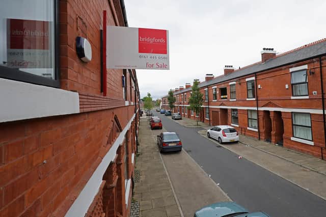 MANCHESTER, ENGLAND - AUGUST 02: Renovated terraced homes in Hulme on August 2, 2016 in Manchester, England. Home ownership acroos the country has seen a sharp drop across Britain, particularly in the North. Home ownership in Manchester has fallen from 72% in 2003 to 58% this year according a to a survey by the The Resolution Foundation. (Photo by Christopher Furlong/Getty Images)