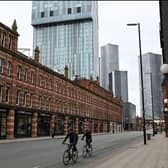 Cyclists riding through Manchester during one of the national lockdowns. Photo: Oli Scarff/AFP via Getty Images