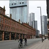 Cyclists riding through Manchester during one of the national lockdowns. Photo: Oli Scarff/AFP via Getty Images