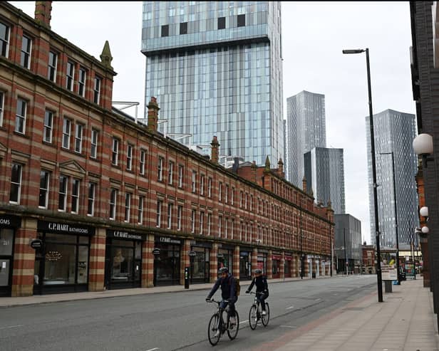 Cyclists riding through Manchester during one of the national lockdowns. Photo: Oli Scarff/AFP via Getty Images