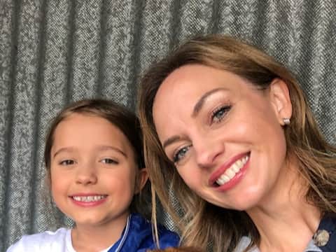School strike organiser Lisa Diaz with her daughter Helena
