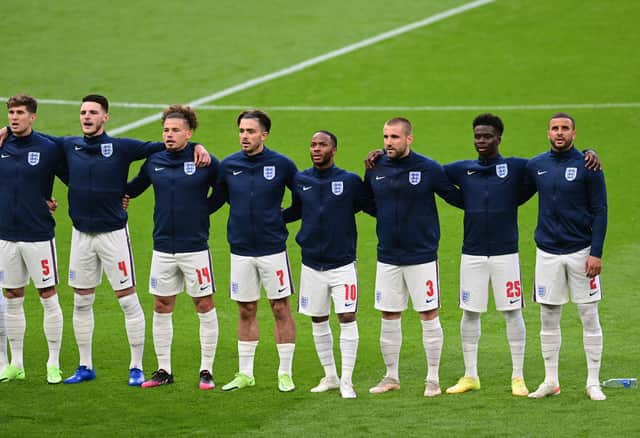 <p>England players sing the national anthem during Euro 2020. Credit: Getty.</p>