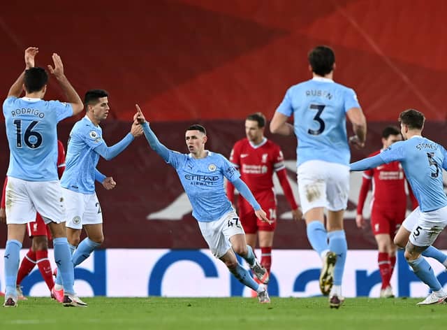 Manchester City won in their last visit to Anfield, though that was without spectators. (Photo by Laurence Griffiths/Getty Images)