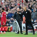 Paul Tierney speaks to Pep Guardiola. Credit: Getty.