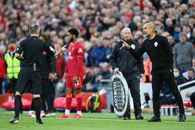 Paul Tierney speaks to Pep Guardiola. Credit: Getty.