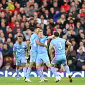 Kevin De Bruyne celebrates scoring against Liverpool. Credit: Getty.