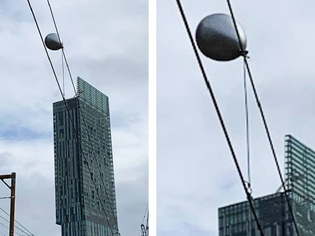 Helium balloon caught on overhead power lines on the Castlefield corridor in Manchester