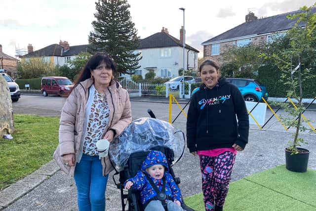 Burrows Avenue resident Mary with her children 