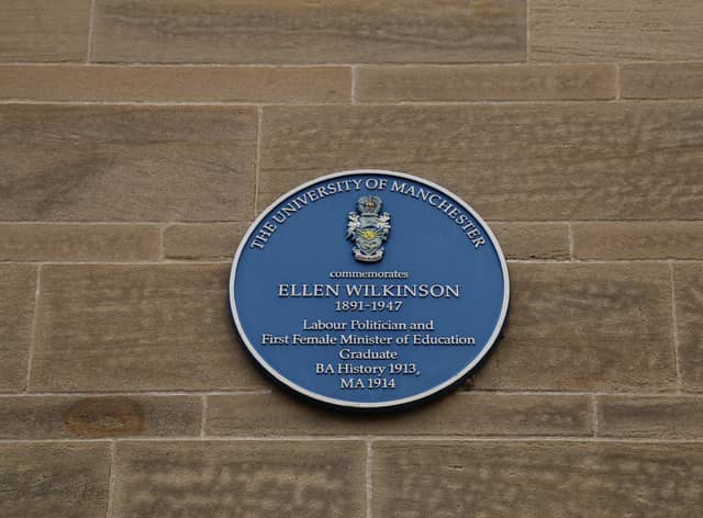 A blue plaque on the side of the University wall in Manchester commemorating Ellen Wilkinson, Labour politician and first female Minister of Education.