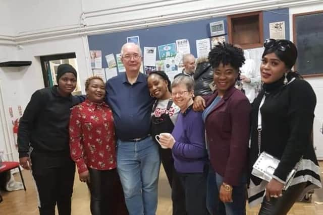 Philip Jones (third from left) supported LGBTQ+ asylum seekers in Manchester