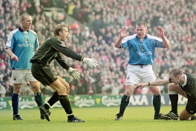 Andy Morrison is fondly remembered for his time at Manchester CIty.  (Photo by Laurence Griffiths/Allsport/Getty Images)