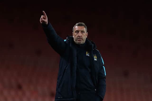 <p>Coach Jason Wilcox gives instructions during the FA Youth Cup semi-final second leg match between Arsenal and Manchester City at Emirates Stadium on April 4, 2016 in London, England.</p>