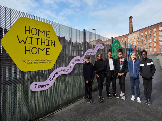 <p>Children from the New Islington Free School with the artwork</p>