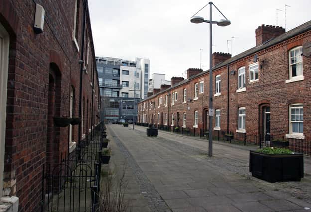 Traditional terraced houses on Anita Street in the Ancoats area of the city.