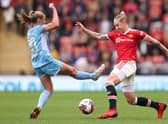 Georgia Stanway was shown a red card for this foul on Leah Galton. (Photo by Naomi Baker/Getty Images)