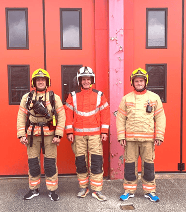 Andy Ball and Ryan Jones with chief fire officer Dave Russel Credit: GM Fire and Rescue