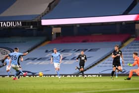Riyad Maherez scores against Burnley. Cedit: Getty.