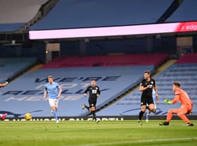 Riyad Maherez scores against Burnley. Cedit: Getty.