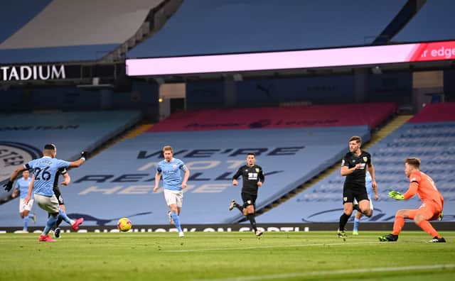 <p>Riyad Maherez scores against Burnley. Cedit: Getty.</p>