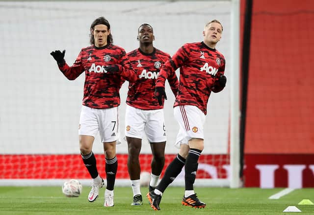 Edinson Cavani, Paul Pogba and Donny van de Beek. Credit: Getty.