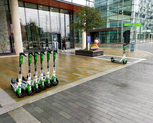 Lime e-scooters at MediaCity Credit: Andrew Fisher