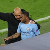 Pep Guardiola and Raheem Sterling. Credit: Getty.