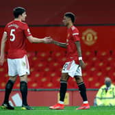 Harry Maguire and Marcus Rashford. Credit: Getty.