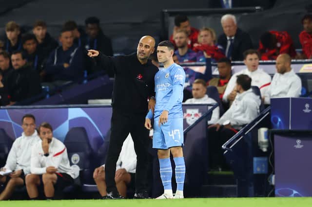 Pep Guardiola and Phil Foden. Credit: Getty.