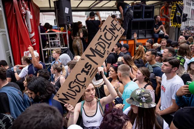 <p>People dancing to a DJ playing on a mobile soundsystem in Piccadilly Circus during a #FreedomToDance protest on June 27, 2021 in London, England. (Photo by Rob Pinney/Getty Images)</p>