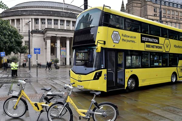 A Bee Network bus and two bicycles. Photo: TfGM