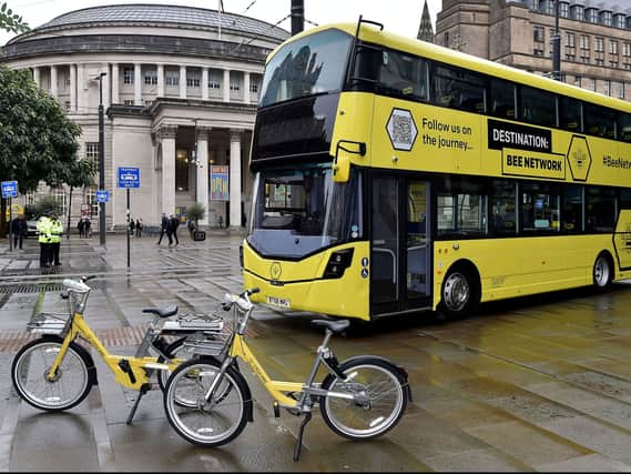 A Bee Network bus and two bicycles. Photo: TfGM