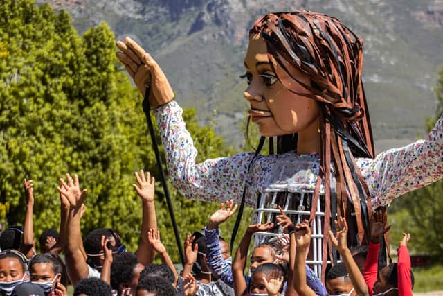 Little Amal is a giant puppet of a Syrian refugee girl travelling across thousands of miles of Europe to Manchester. Photo: Bevan Ross