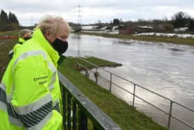 Boris Johnson visits flood hit Manchester earlier in the year