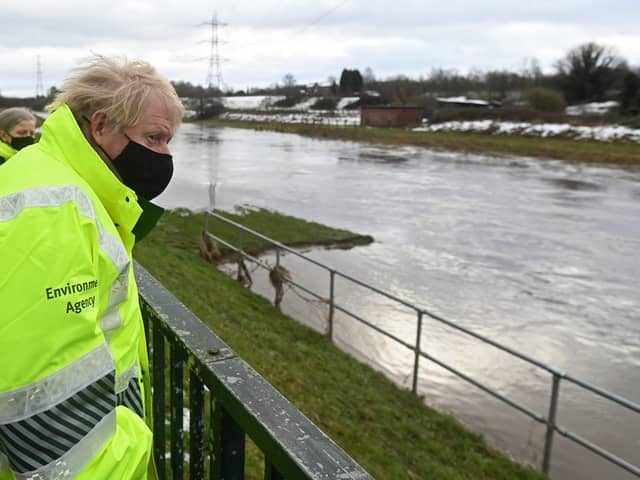 Boris Johnson visits flood hit Manchester earlier in the year