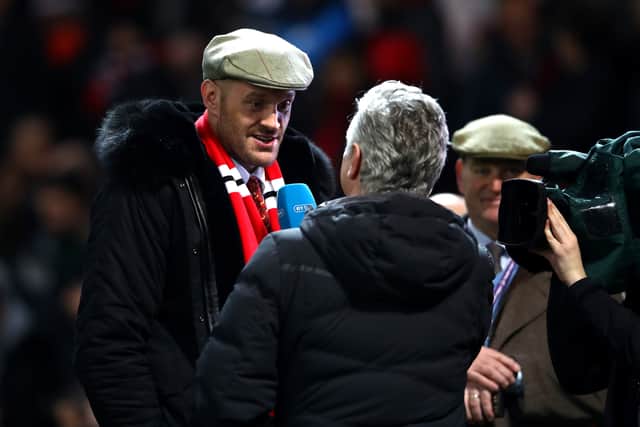 Tyson Fury, pictured here at Old Trafford, is a Manchester United supporter. Credit: Getty.
