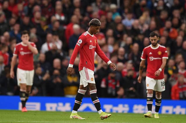<p>Harry Maguire, Marcus Rashford and Bruno Fernandes. Credit: Getty.</p>