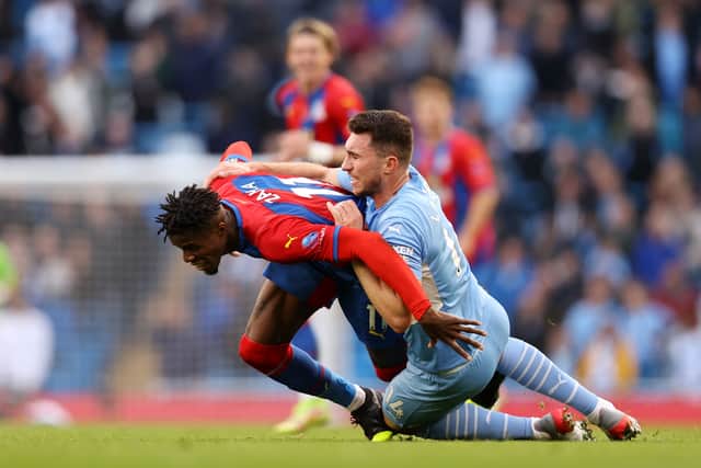 Laporte saw red for this challenge on Zaha. Credit: Getty.