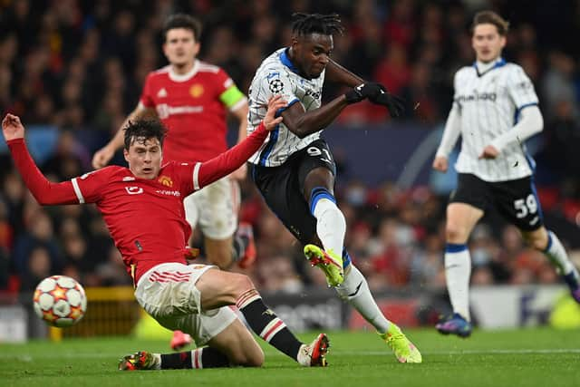 Victor Lindelof tackles Duvan Zapata. Credit: Getty.